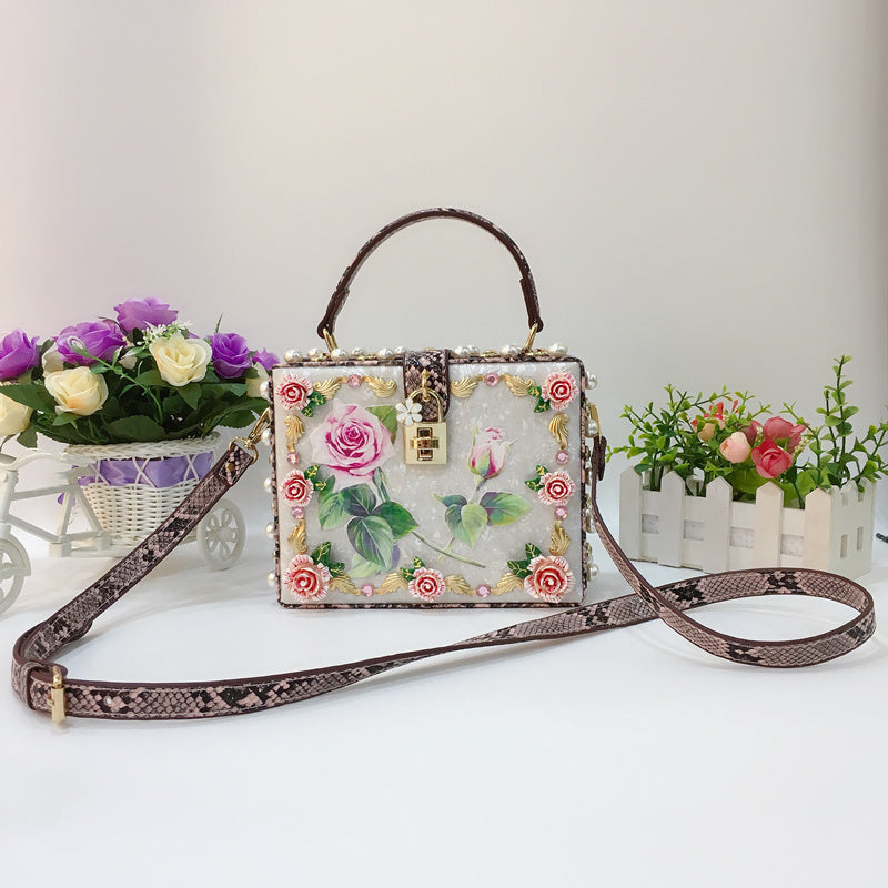 Bolso bandolera portátil estilo occidental con hebilla de bloqueo y diseño de serpiente, con flores blancas, rosas y perlas