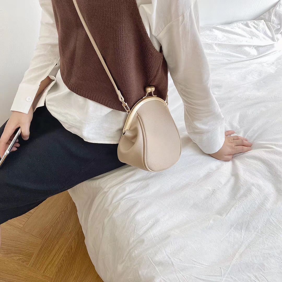 Petit sac messager rond à une épaule simple et polyvalent pour femme