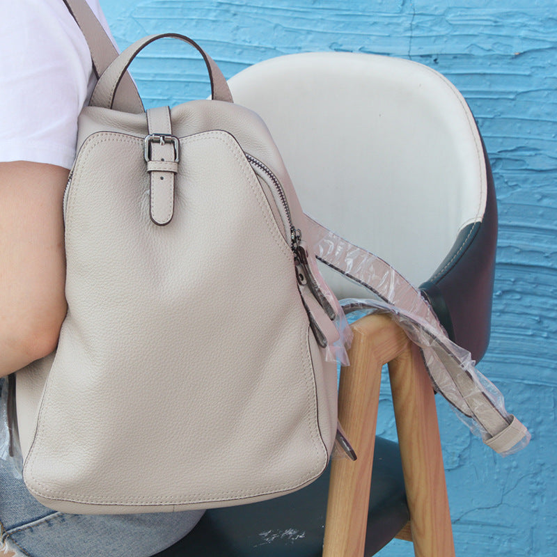 Mochila de piel de vaca con capa superior de color liso a la moda para mujer