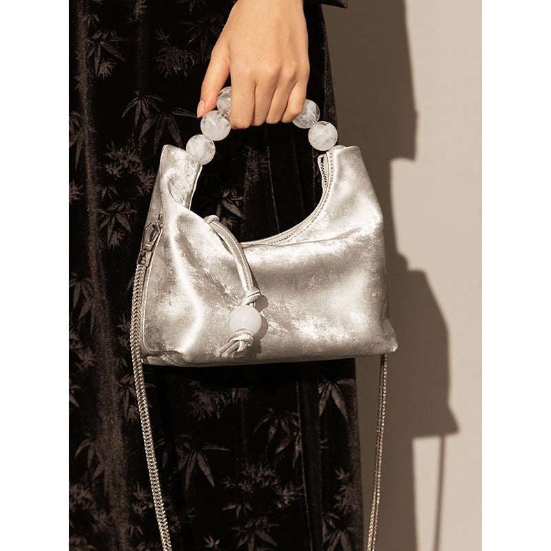 Bolso bandolera con cadena de perlas y hombro Niche