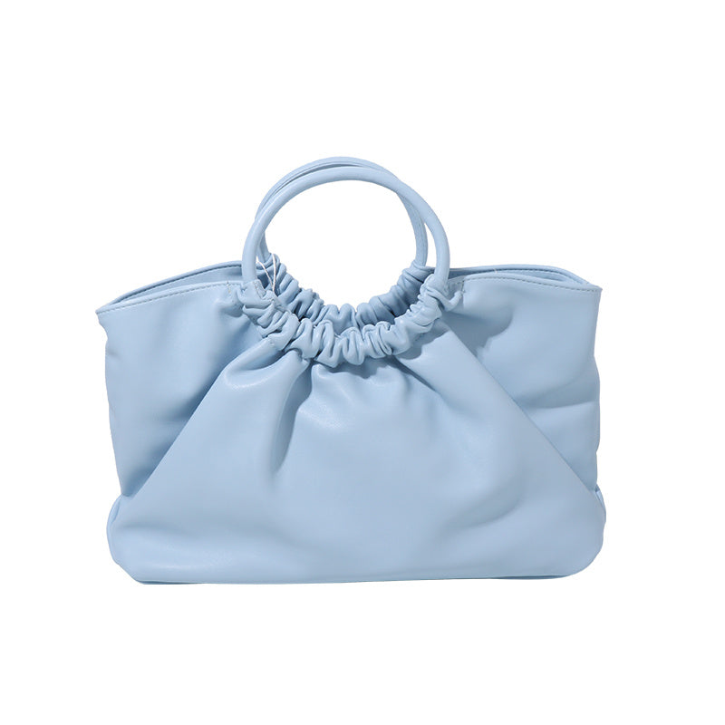 Petit sac à main design circulaire pour femme en été