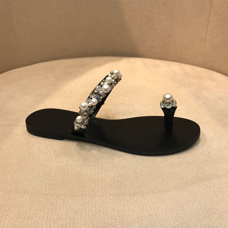 Sandalias planas con punta abatible para mujer con tiras de perlas y diamantes de imitación para exteriores