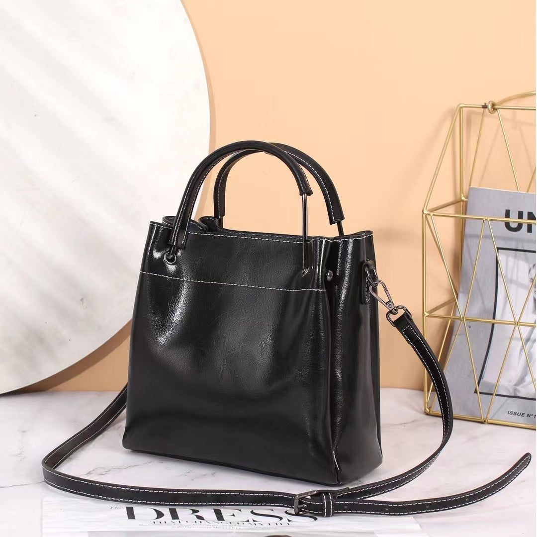 Sac seau portable à bandoulière en cuir pour femme