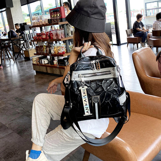 Mochila estilo occidental de cuero suave con banda ancha y un solo hombro