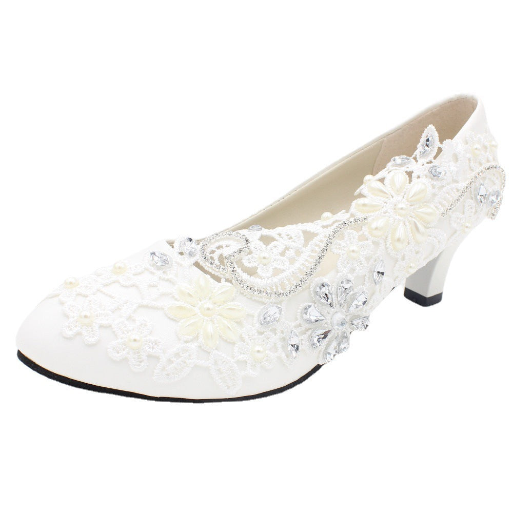 Zapatos de boda blancos de tacón alto con encaje y diamantes de imitación