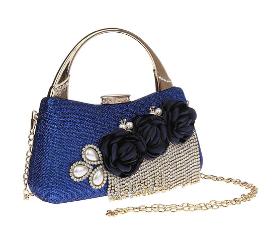 Bolso delicado con borlas y elegante flor dorada