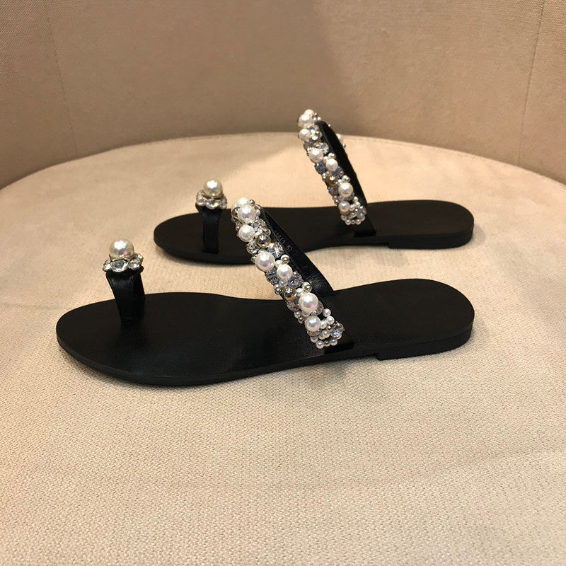 Sandalias planas con punta abatible para mujer con tiras de perlas y diamantes de imitación para exteriores