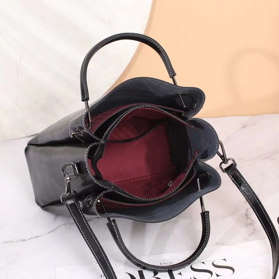 Sac seau portable à bandoulière en cuir pour femme