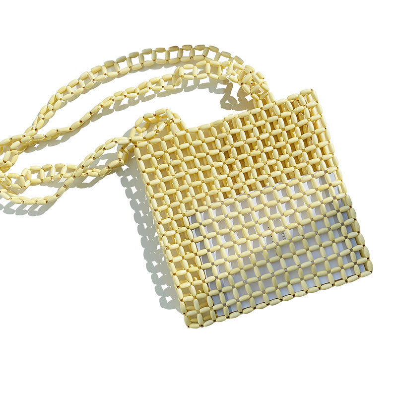 Sac à bandoulière diagonale en perles de bois tissé à la main avec design de niche