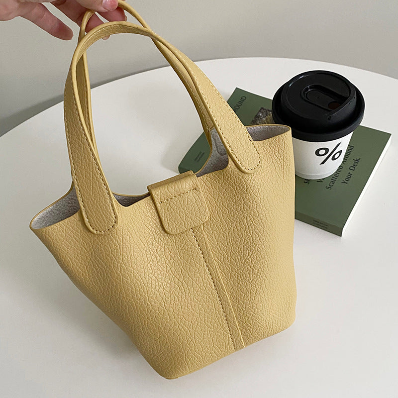 Sac à main en cuir souple à motif litchi simple et décontracté de couleur unie