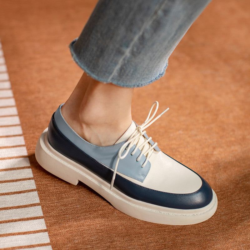 Mocasines blancos con plataforma y cordones de piel auténtica