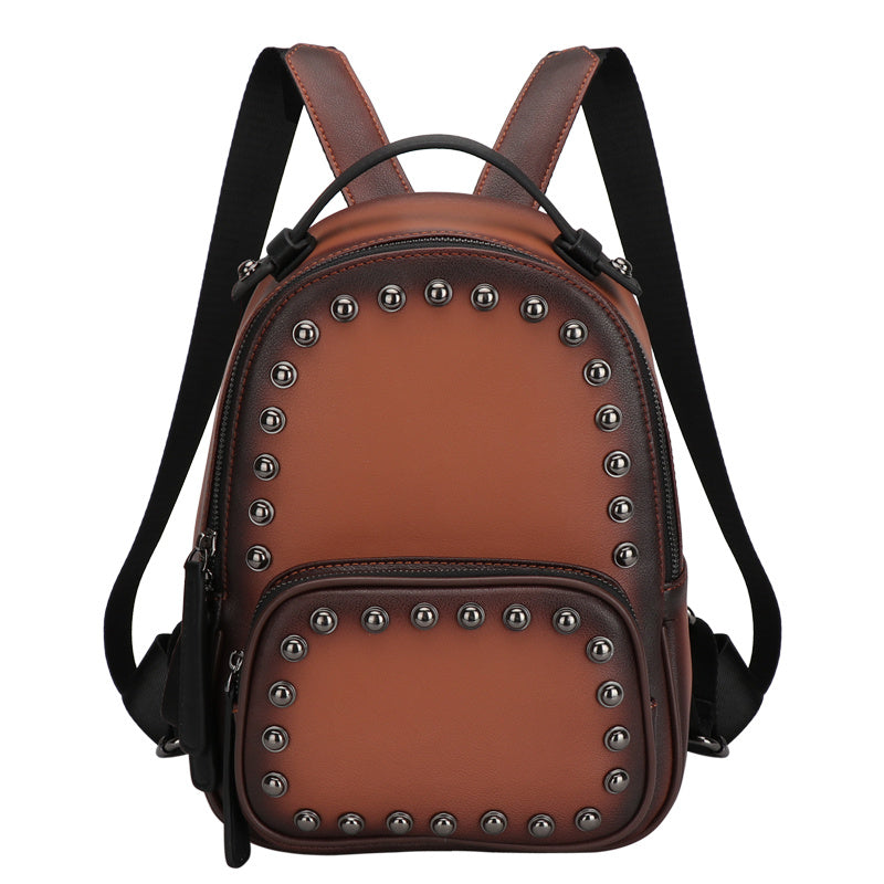 Mochila de piel de vaca con remaches de capa superior, bolso informal para mujer que combina con todo