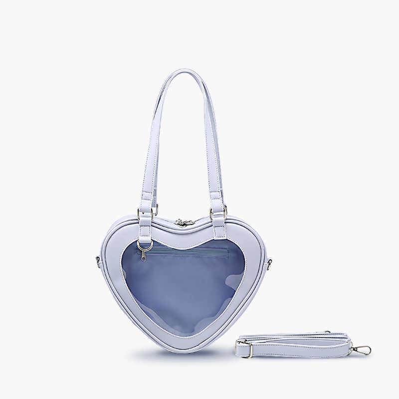 Bolso bandolera transparente con forma de muñeca Love Small Pain