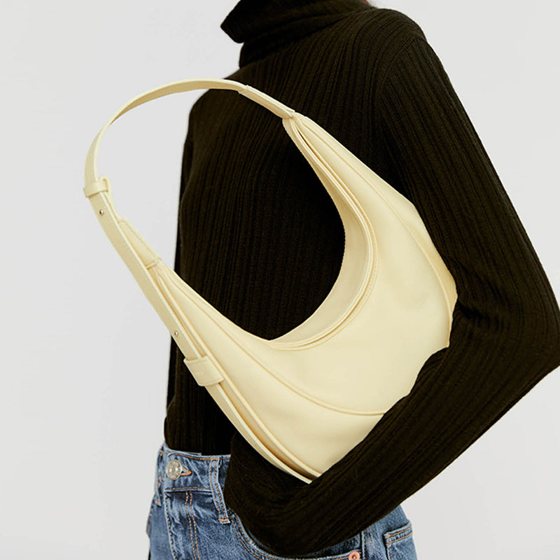 Bolso nuevo estilo Chaoxia Semicircle de alta calidad de cuero suave de gran capacidad para estudiantes bolso de mano tipo sillín