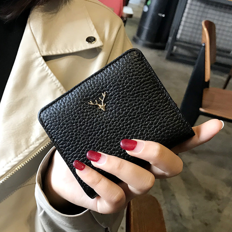 Monedero pequeño de cuero plegable ultrafino para mujer, billetera de moda coreana