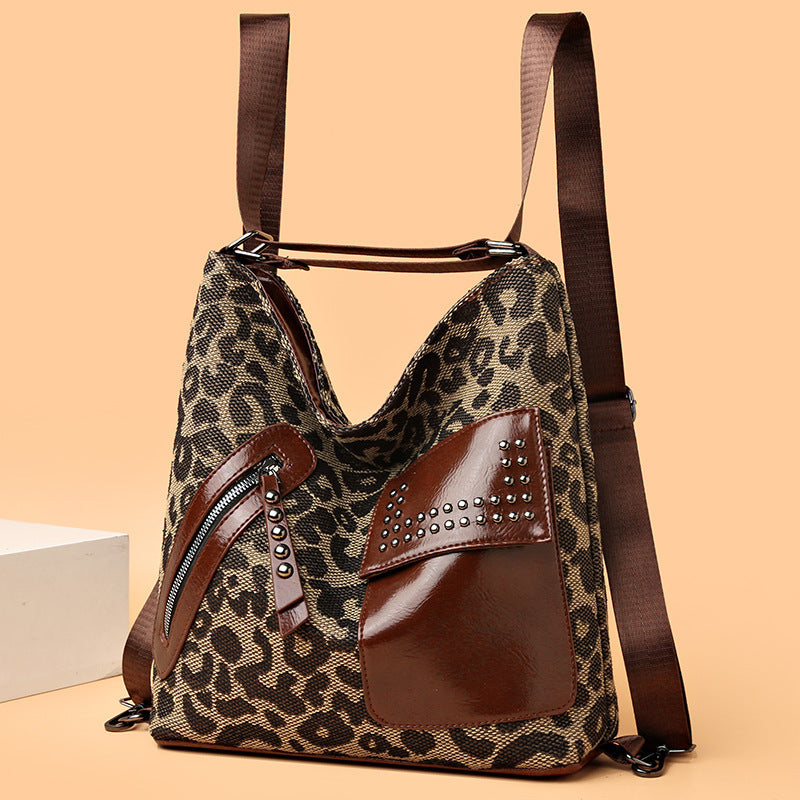 Mochila de pata de gallo para mujer, diseño de remaches a la moda, bolsos de hombro de leopardo