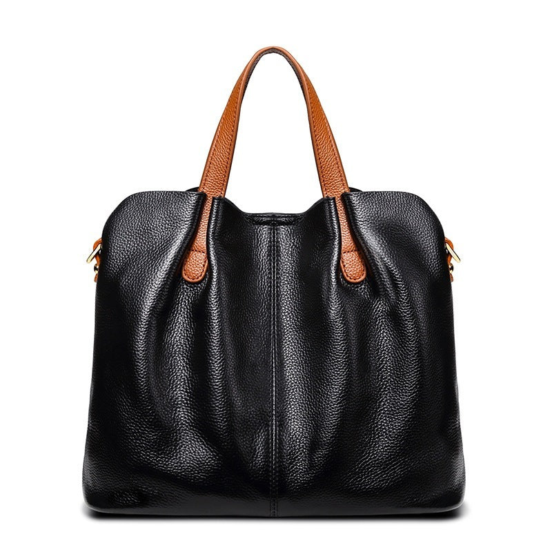 Bolso de mano sencillo e informal de piel suave para mujer