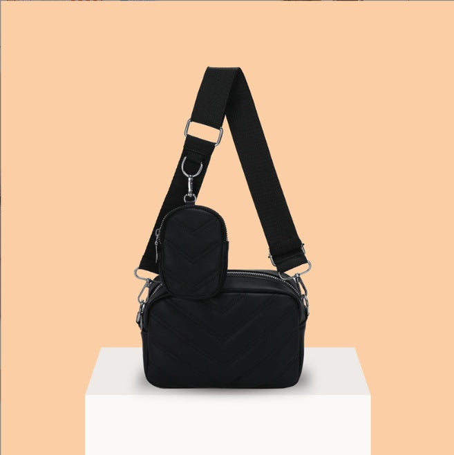 Bolso de hombro con línea bordada simple de cuero suave texturizado estilo retro