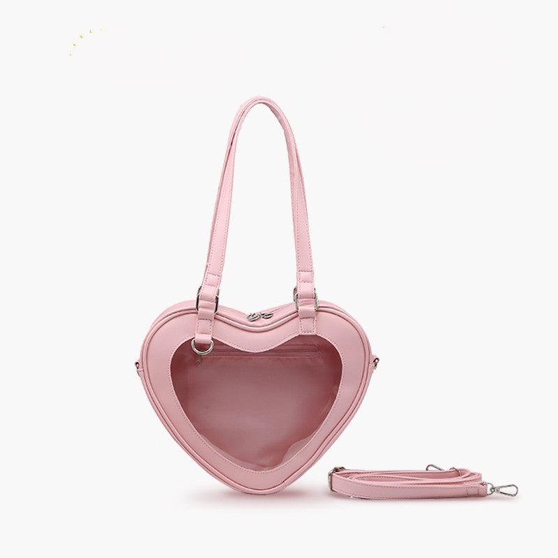 Bolso bandolera transparente con forma de muñeca Love Small Pain