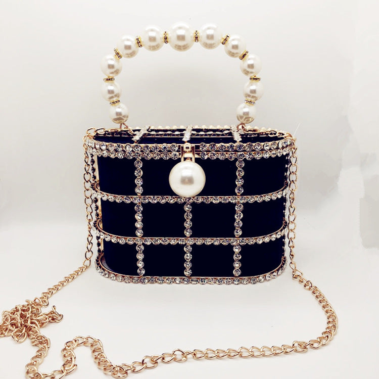 Hollow Pearl Buckle Birdcage Clutch