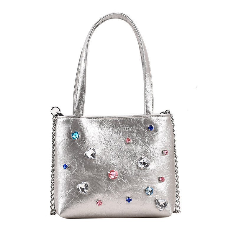 Bolso portátil con textura de nicho y diamantes de imitación para mujer