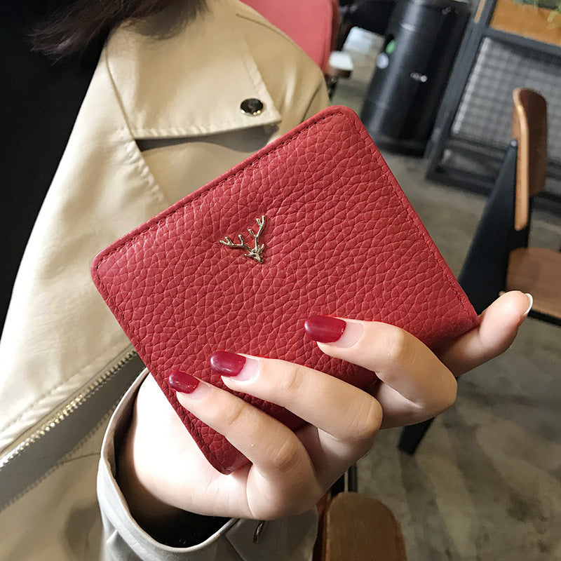 Monedero pequeño de cuero plegable ultrafino para mujer, billetera de moda coreana