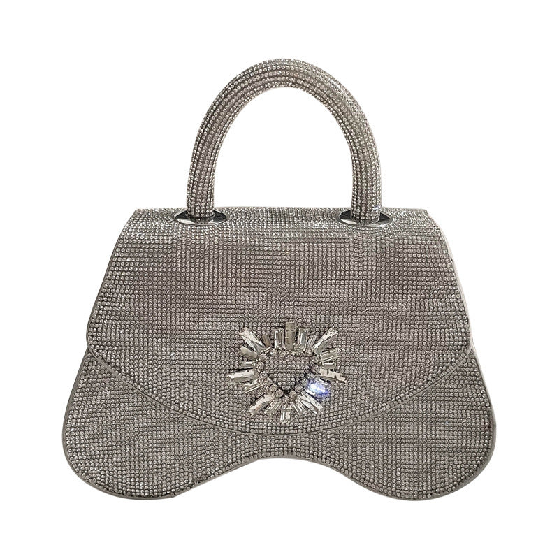 Bolso diseñado por una minoría femenina con diamantes de imitación