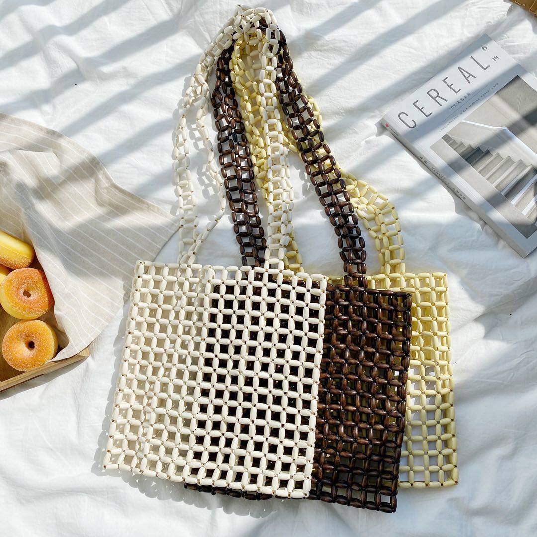 Sac à bandoulière diagonale en perles de bois tissé à la main avec design de niche