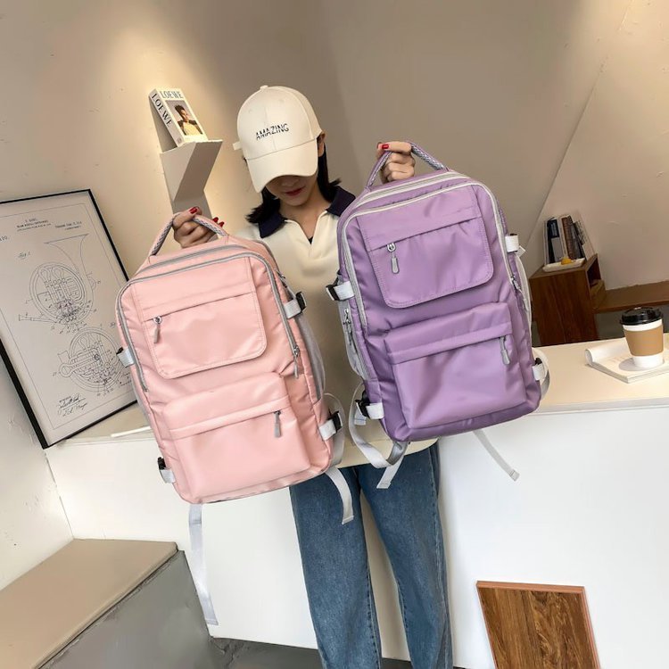 Mochila de viaje de moda de color sólido con separación de ropa seca y húmeda