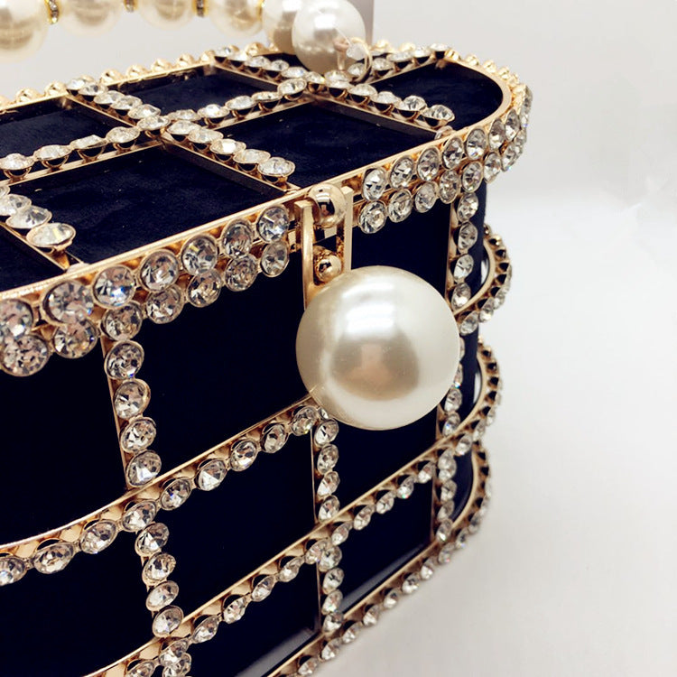 Hollow Pearl Buckle Birdcage Clutch