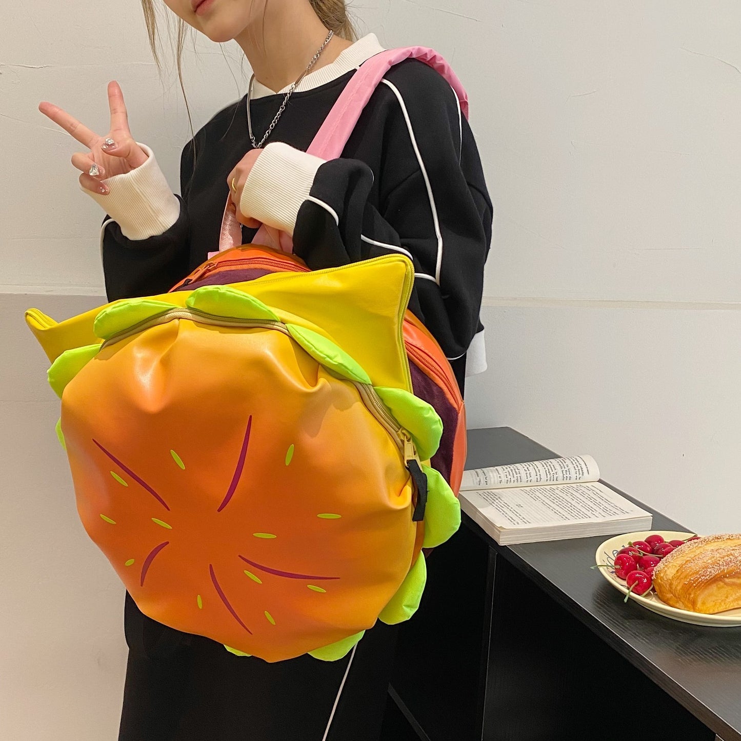 Mochila escolar de gran capacidad con múltiples capas y forma de hamburguesa