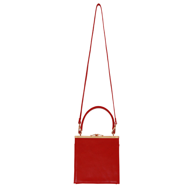 Bolso bandolera estilo clip retro