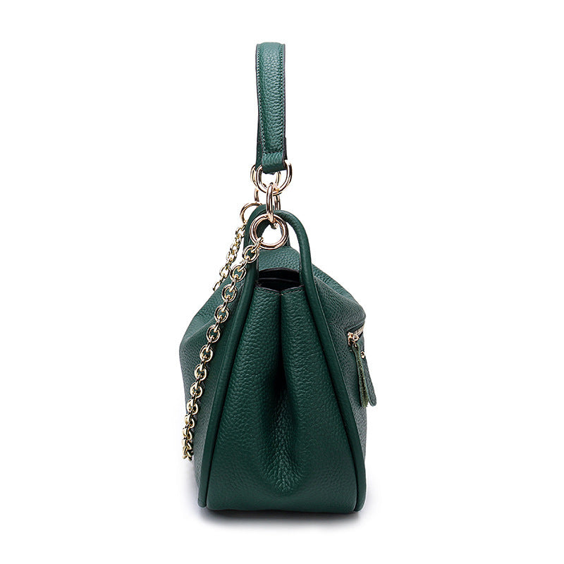 Bolso de mano de cuero con cadena y puntera para dama