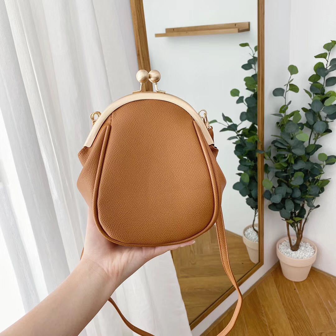 Petit sac messager rond à une épaule simple et polyvalent pour femme