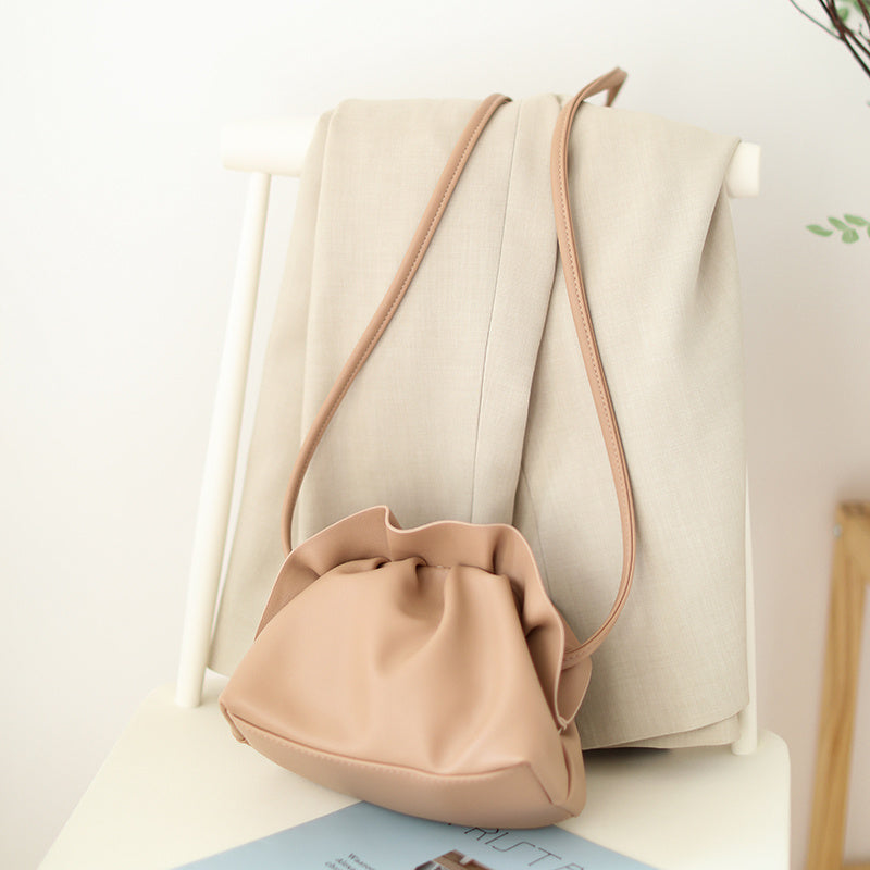 Bolso de mano estilo retro coreano de piel suave con forma de bola de masa, bolso pequeño diagonal de un solo hombro a la moda para mujer