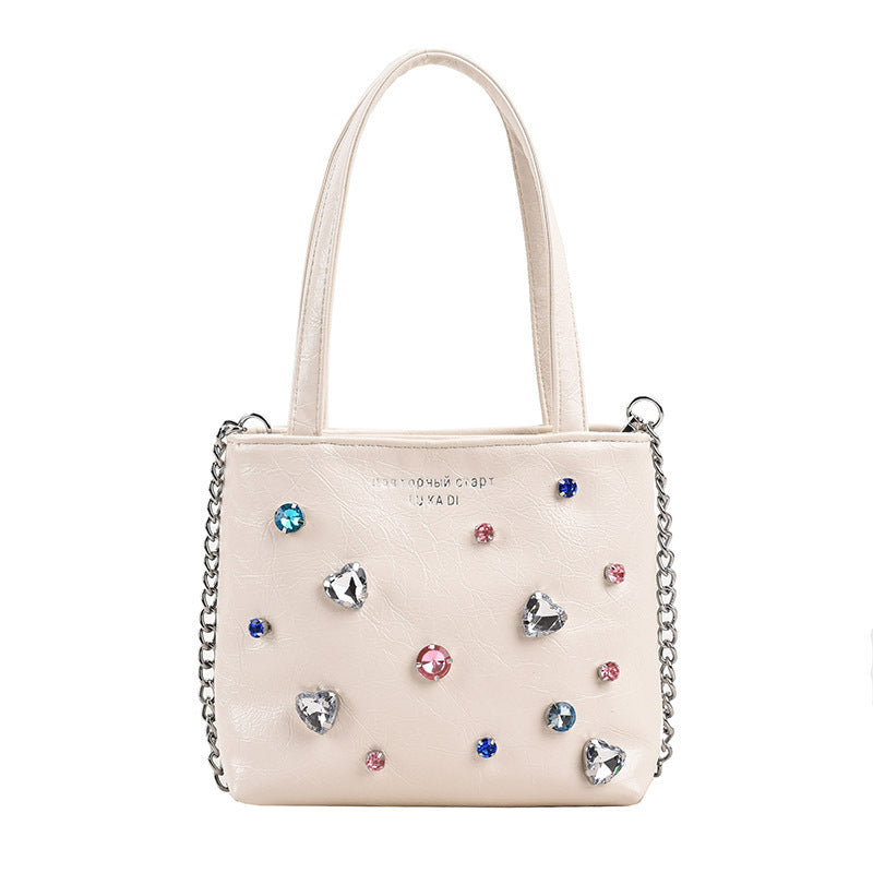 Bolso portátil con textura de nicho y diamantes de imitación para mujer