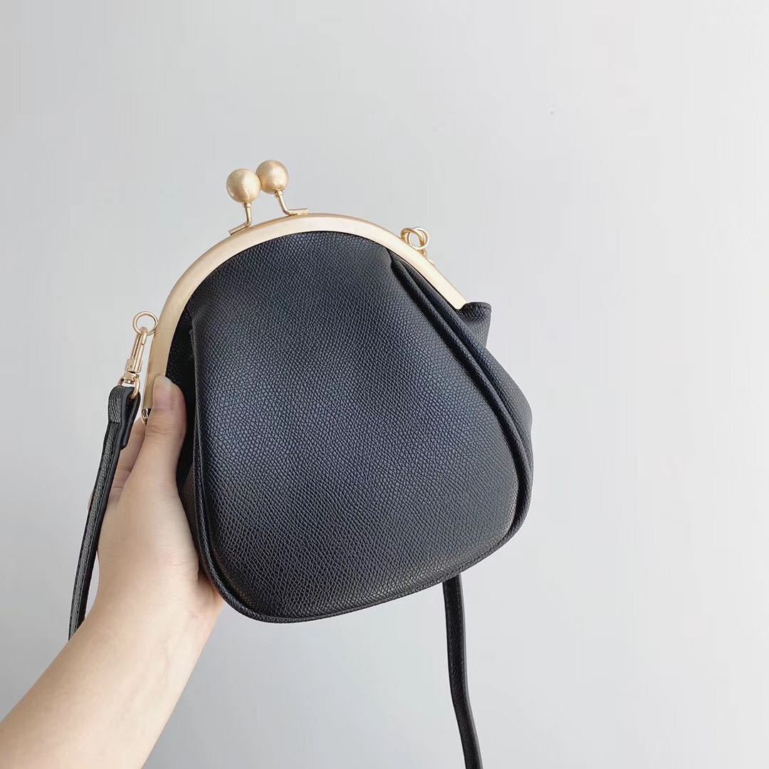 Petit sac messager rond à une épaule simple et polyvalent pour femme