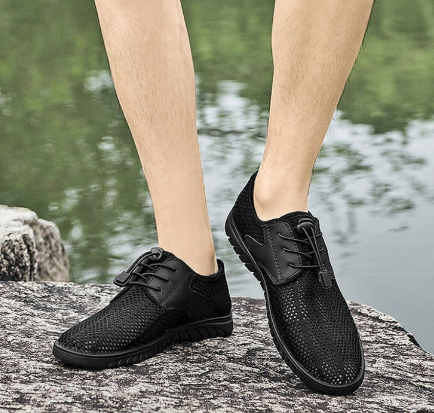 Zapatillas de deporte de verano transpirables con superficie hueca, zapatos de malla finos para hombre