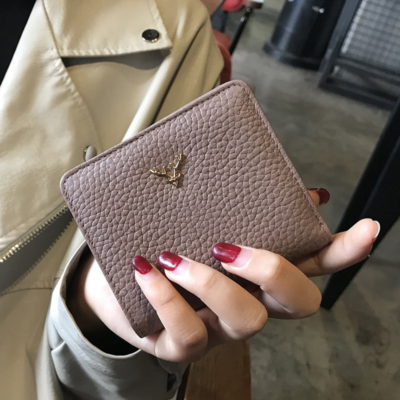 Monedero pequeño de cuero plegable ultrafino para mujer, billetera de moda coreana