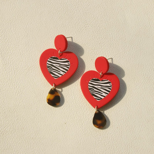 Boucles d'oreilles géométriques contrastées en acrylique