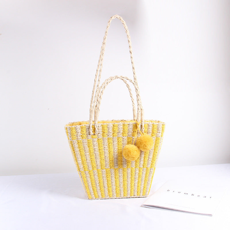 Version coréenne du sac à main à une épaule pour femme en paille avec boule de cheveux