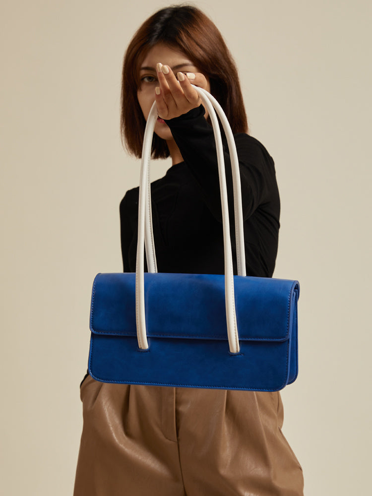 Bolso de mano de mujer High Sense Of Klein en color azul en contraste