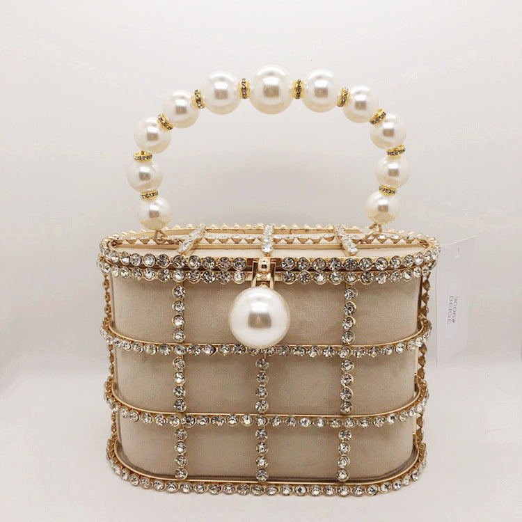 Hollow Pearl Buckle Birdcage Clutch