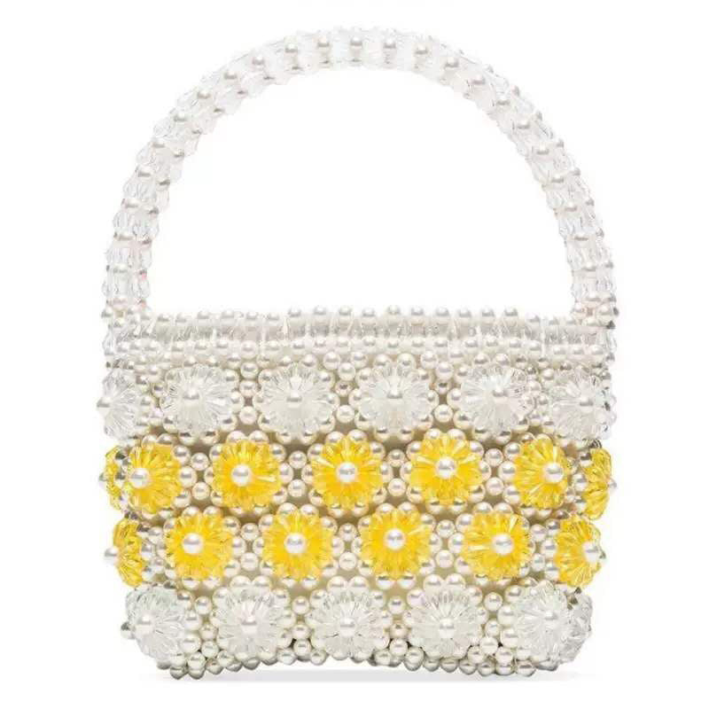 Bolso de mano con perlas y flores de crisantemo